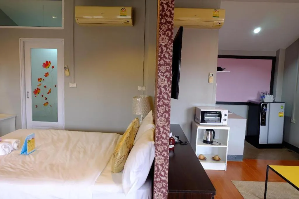 Bed in Winhouse Hotel