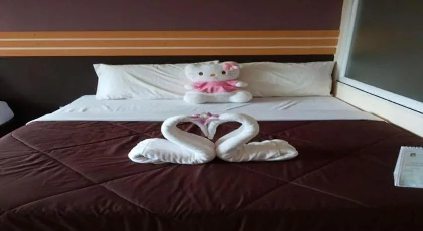 Bed in Winhouse Hotel