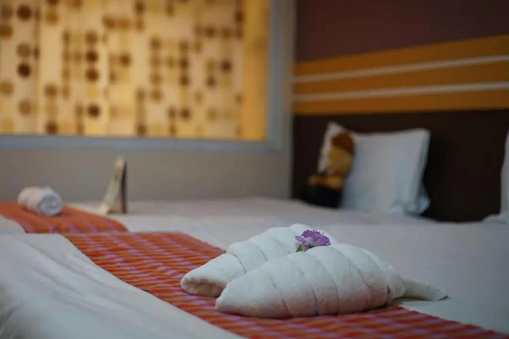 Bed in Winhouse Hotel