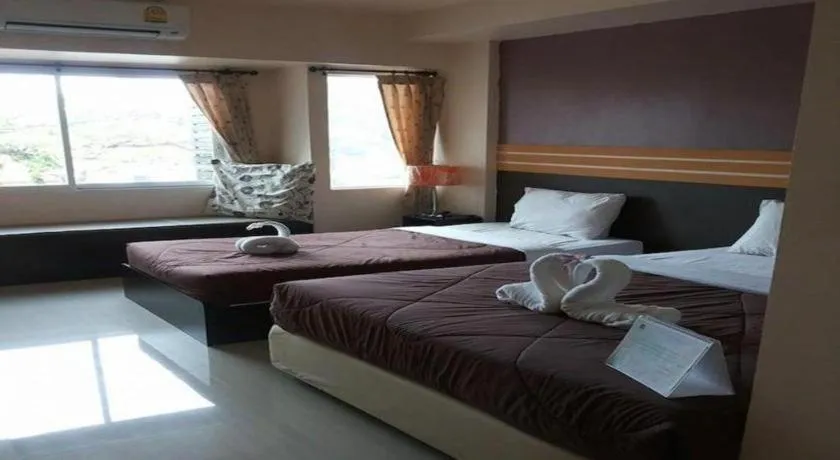 Bed in Winhouse Hotel