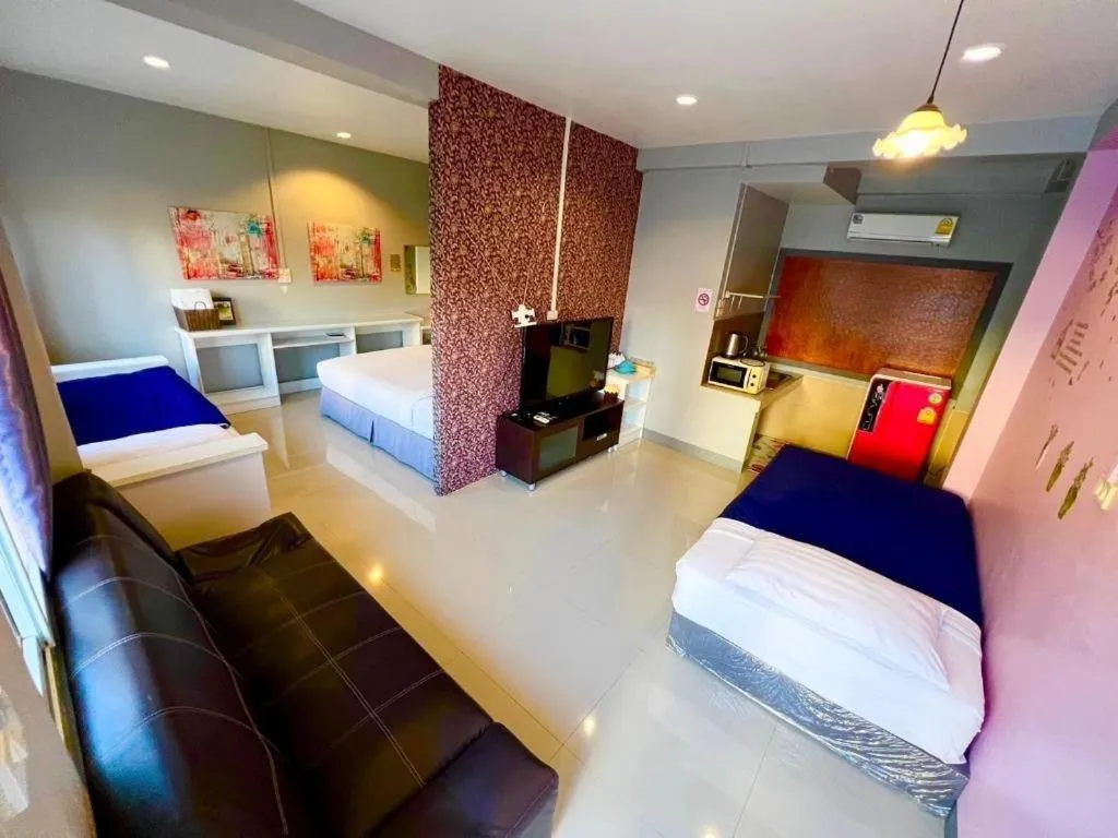 Bed in Winhouse Hotel