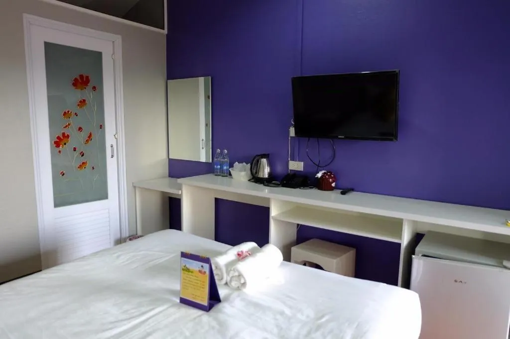 Bed in Winhouse Hotel