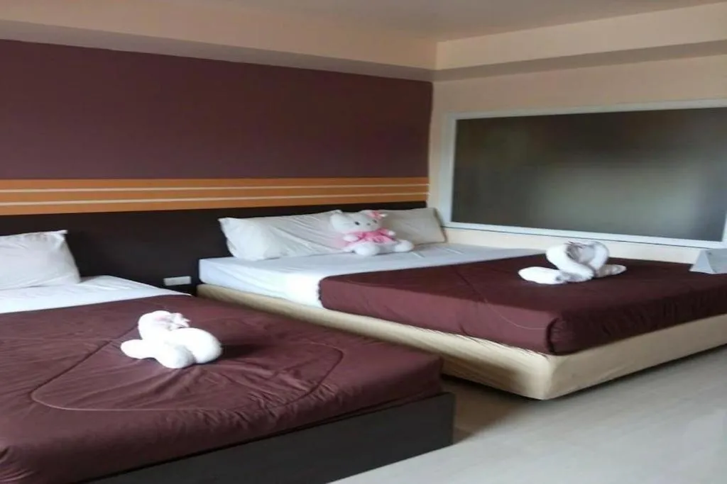 Bed in Winhouse Hotel