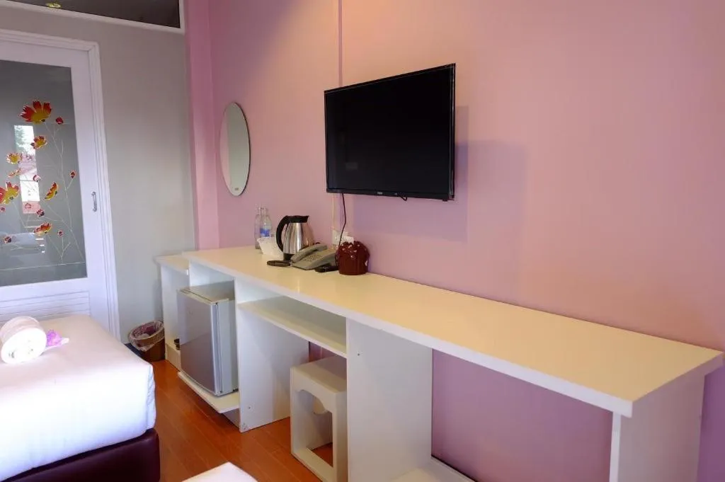 Bed in Winhouse Hotel