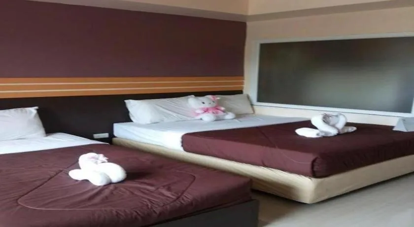 Bed in Winhouse Hotel