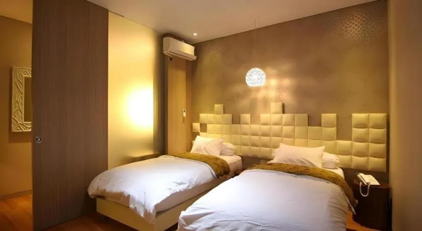 Bed in Griya Jogja Hotel