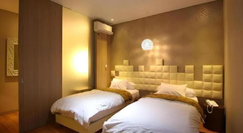 Bed in Griya Jogja Hotel