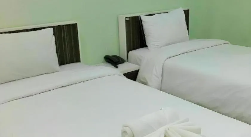 Bed in Chevasai Huahin Hotel