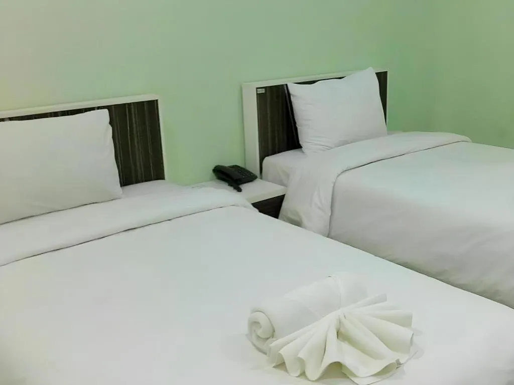 Bed in Chevasai Huahin Hotel
