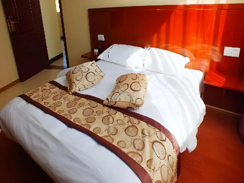 Bed in Lijiang Precious Dream Hotel