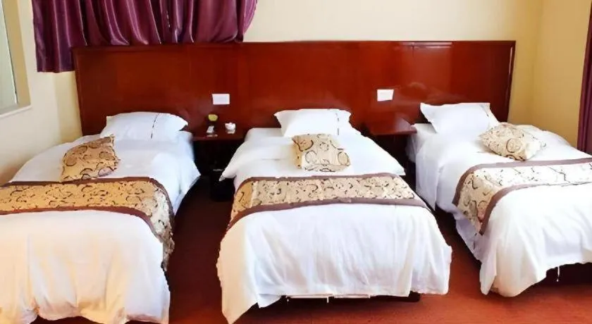 Bed in Lijiang Precious Dream Hotel
