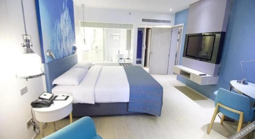 Bed in Grand Scenaria Hotel