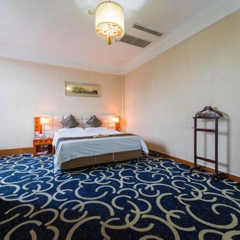 Bed in Pingdingshan Feixing Crowne Plaza Hotel