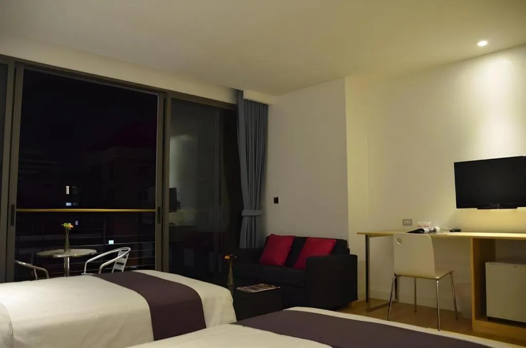 Bed in The Scenery City Hotel