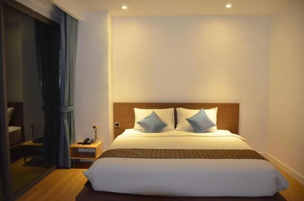 Bed in The Scenery City Hotel