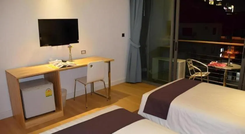 Bed in The Scenery City Hotel