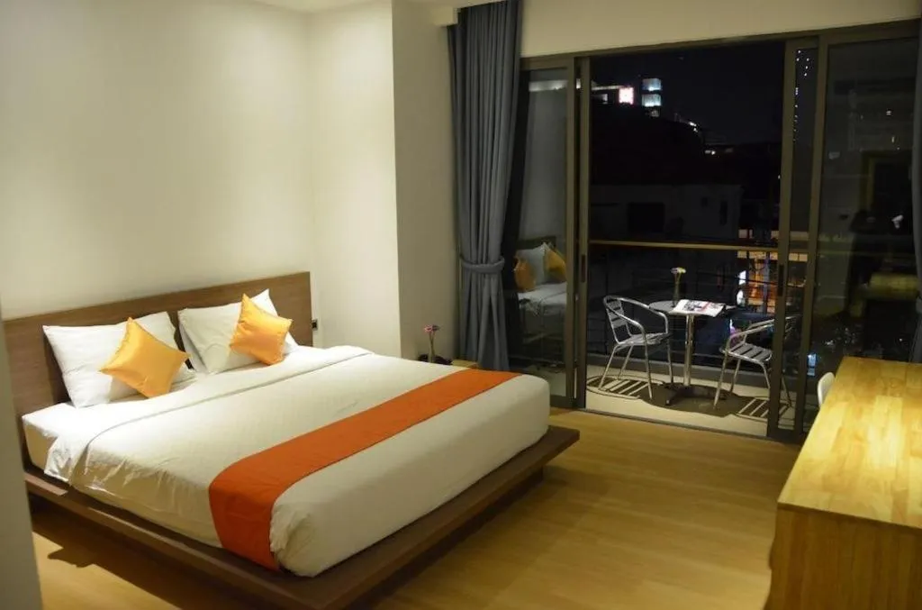 Bed in The Scenery City Hotel