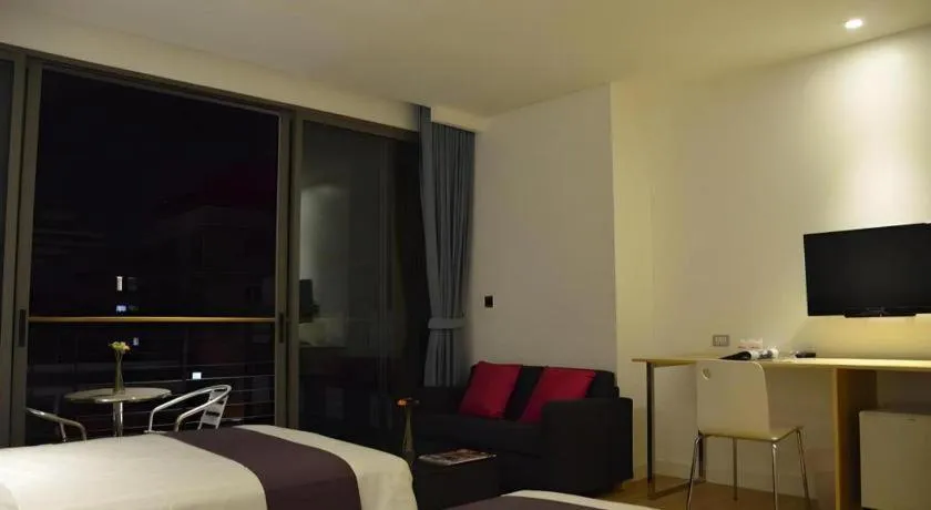 Bed in The Scenery City Hotel