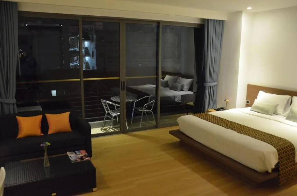 Bed in The Scenery City Hotel