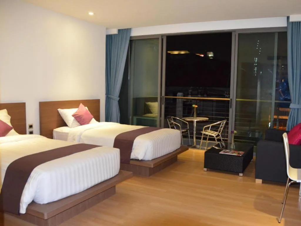 Bed in The Scenery City Hotel