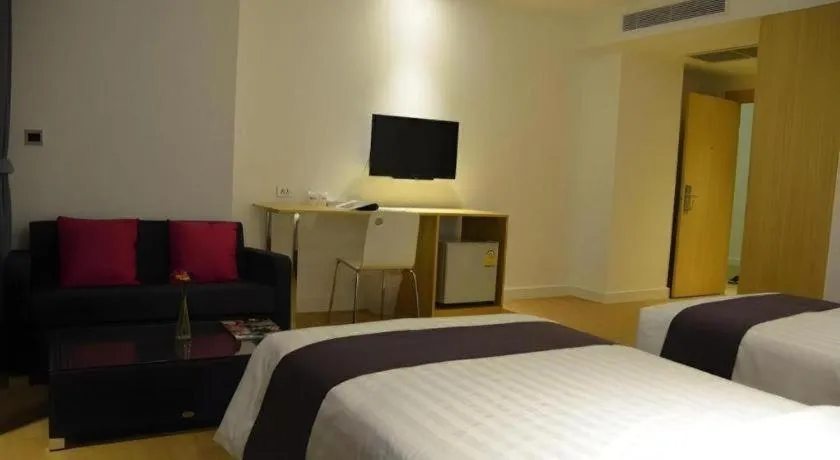 Bed in The Scenery City Hotel