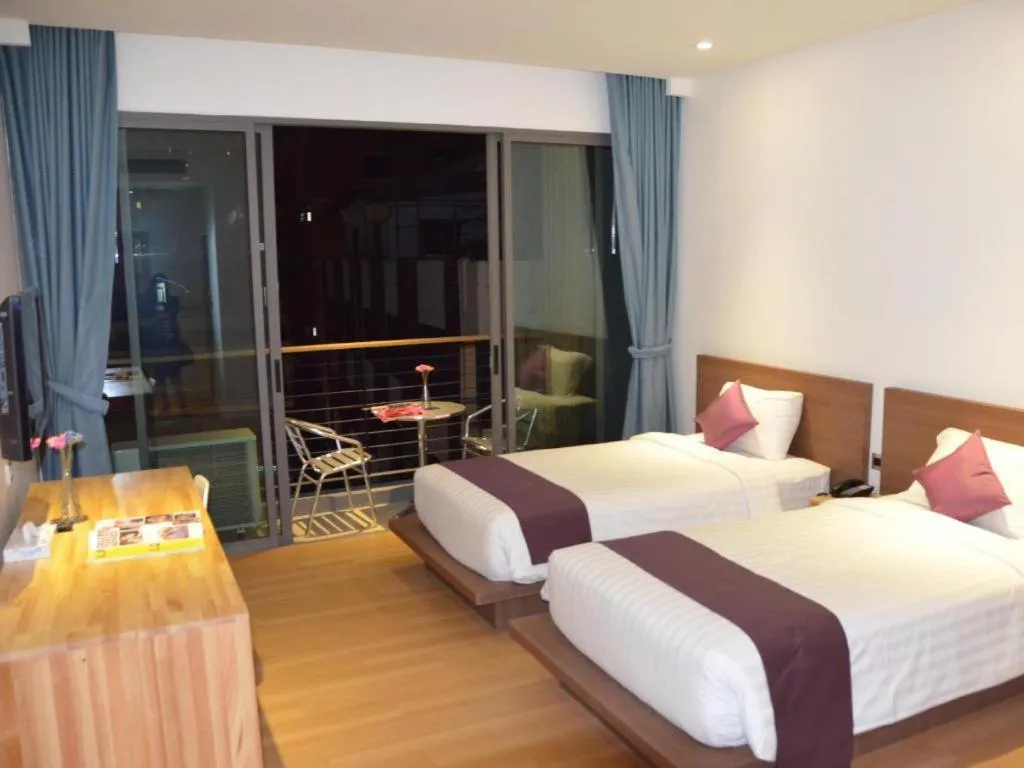 Bed in The Scenery City Hotel