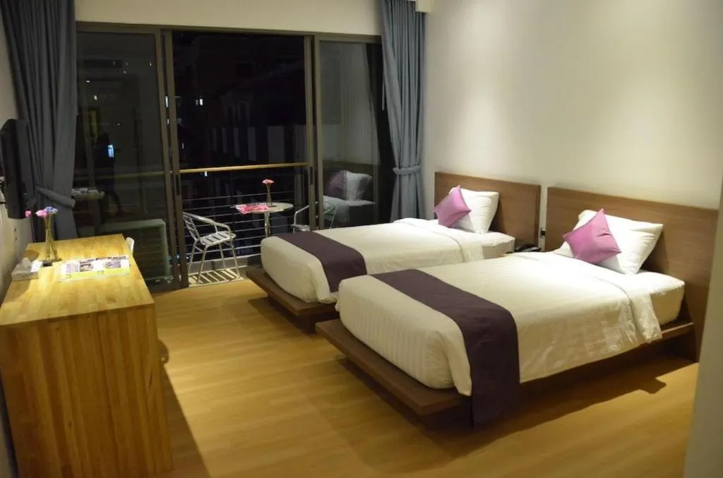 Bed in The Scenery City Hotel