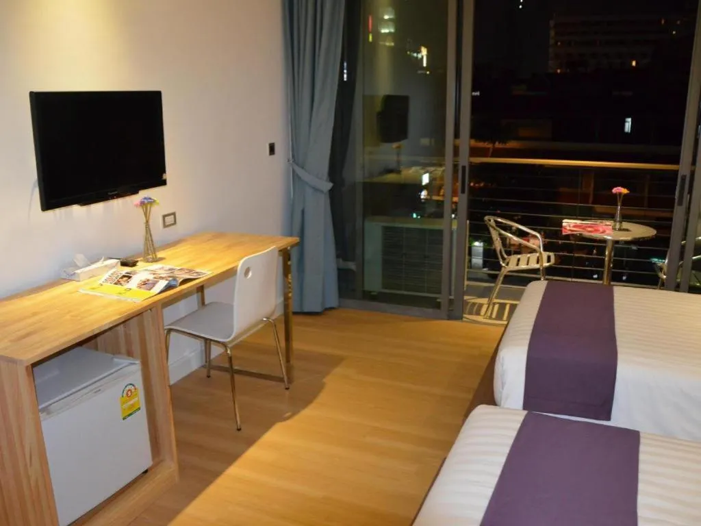 Bed in The Scenery City Hotel