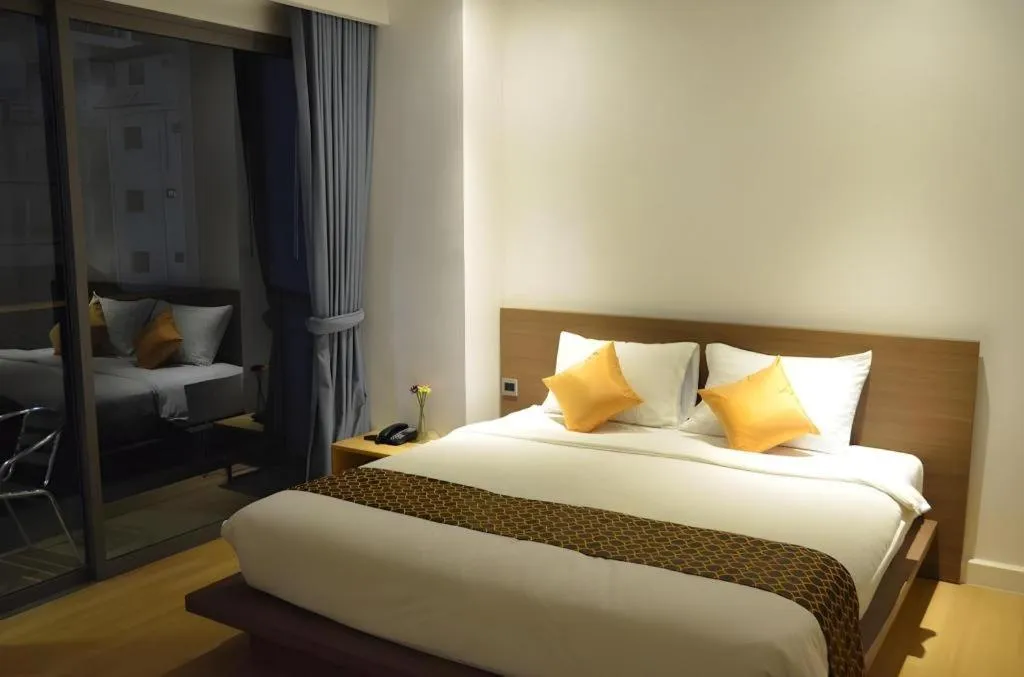 Bed in The Scenery City Hotel