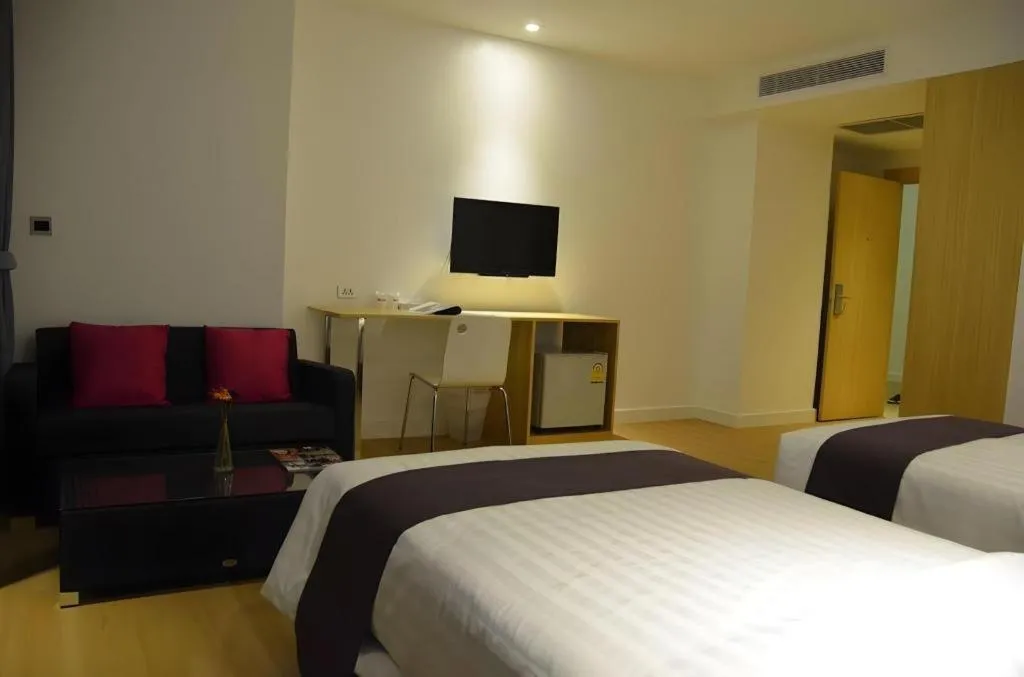 Bed in The Scenery City Hotel