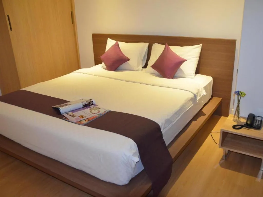 Bed in The Scenery City Hotel