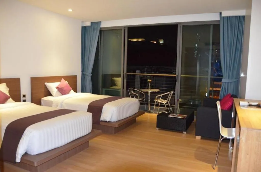 Bed in The Scenery City Hotel