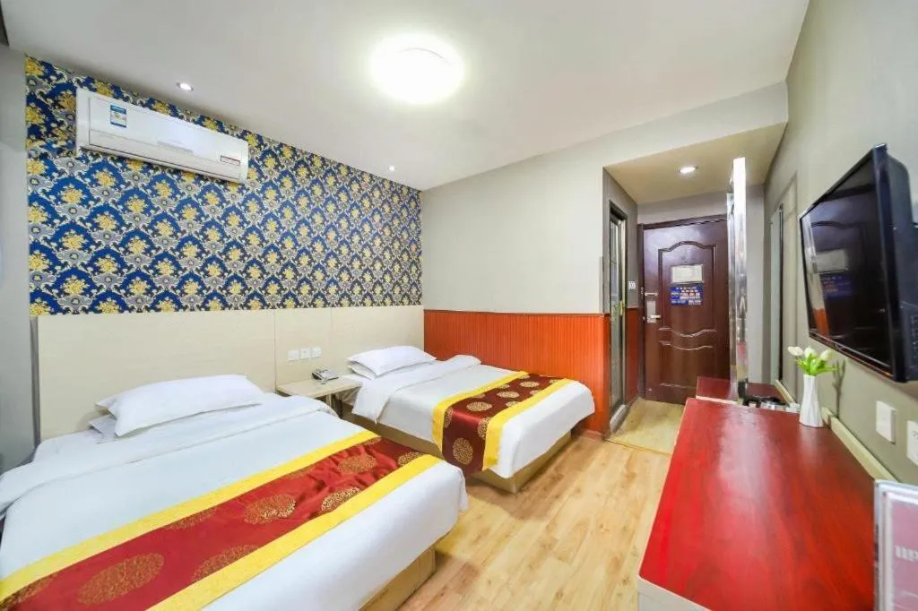 Bed in Kunlun Leju Business Hotel Kaifeng Gulou
