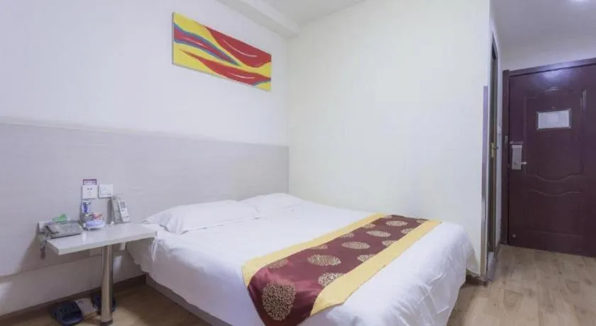 Bed in Kunlun Leju Business Hotel Kaifeng Gulou