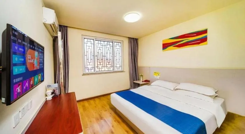 Bed in Kunlun Leju Business Hotel Kaifeng Gulou