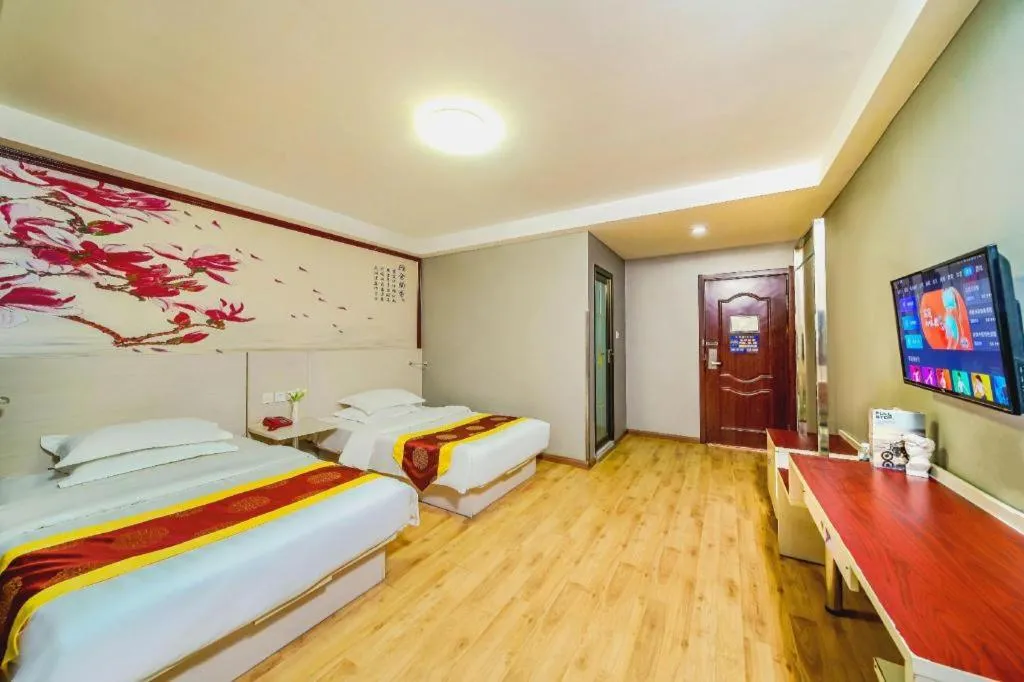 Bed in Kunlun Leju Business Hotel Kaifeng Gulou