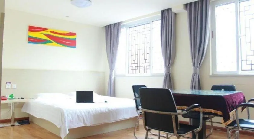 Bed in Kunlun Leju Business Hotel Kaifeng Gulou