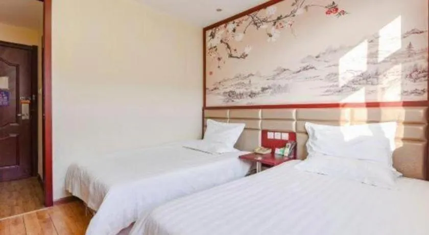 Bed in Kunlun Leju Business Hotel Kaifeng Gulou