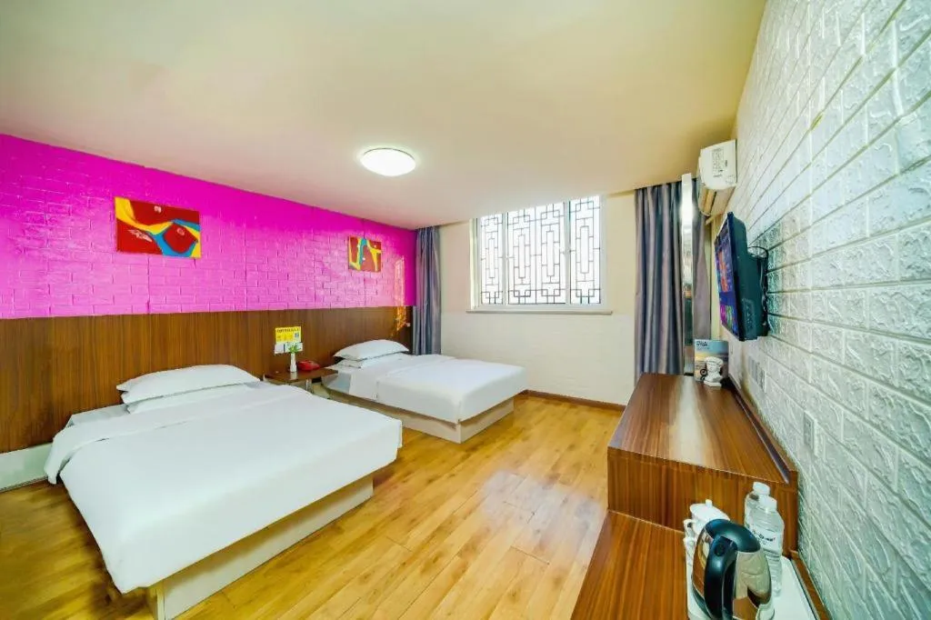 Bed in Kunlun Leju Business Hotel Kaifeng Gulou