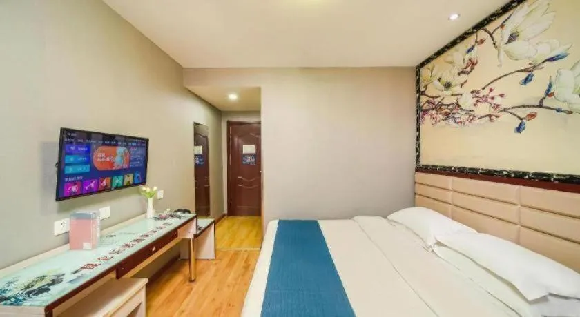 Bed in Kunlun Leju Business Hotel Kaifeng Gulou