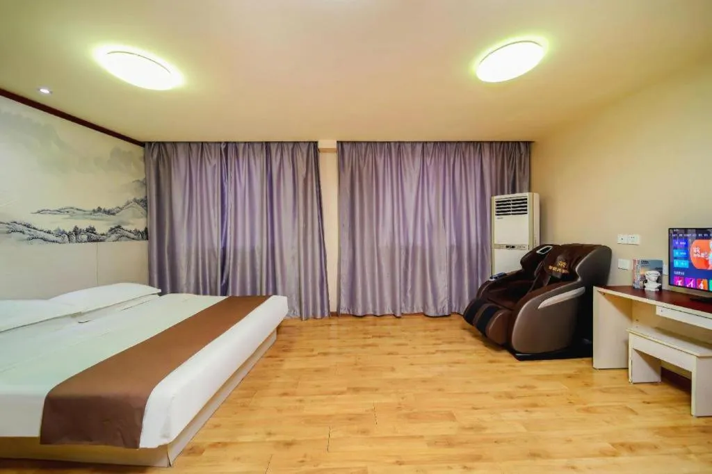 Bed in Kunlun Leju Business Hotel Kaifeng Gulou