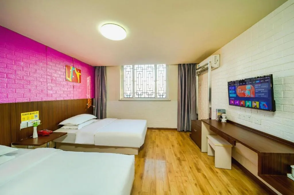 Bed in Kunlun Leju Business Hotel Kaifeng Gulou
