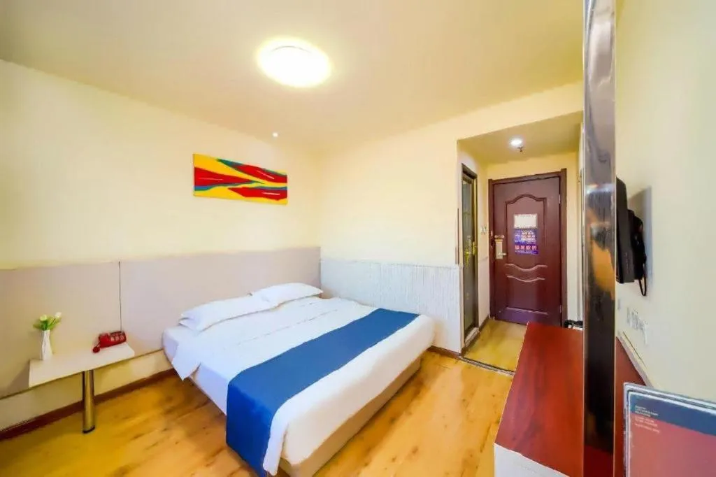 Bed in Kunlun Leju Business Hotel Kaifeng Gulou