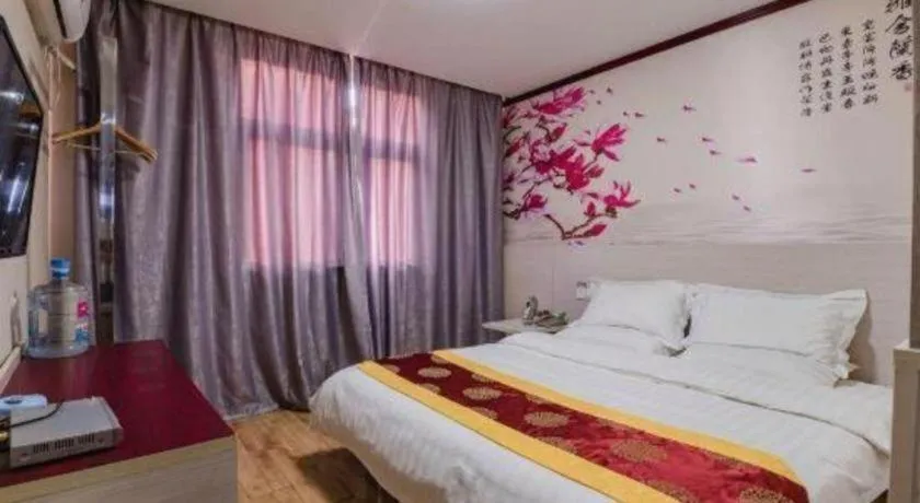 Bed in Kunlun Leju Business Hotel Kaifeng Gulou