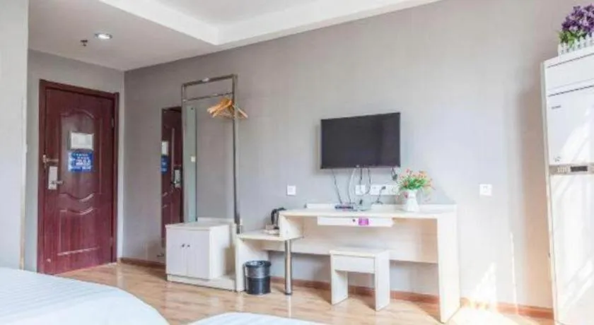 Bed in Kunlun Leju Business Hotel Kaifeng Gulou