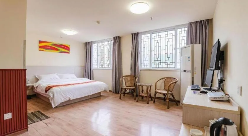 Bed in Kunlun Leju Business Hotel Kaifeng Gulou