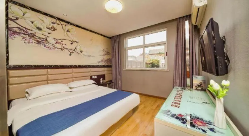 Bed in Kunlun Leju Business Hotel Kaifeng Gulou