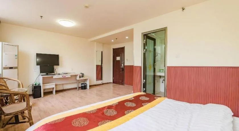 Bed in Kunlun Leju Business Hotel Kaifeng Gulou