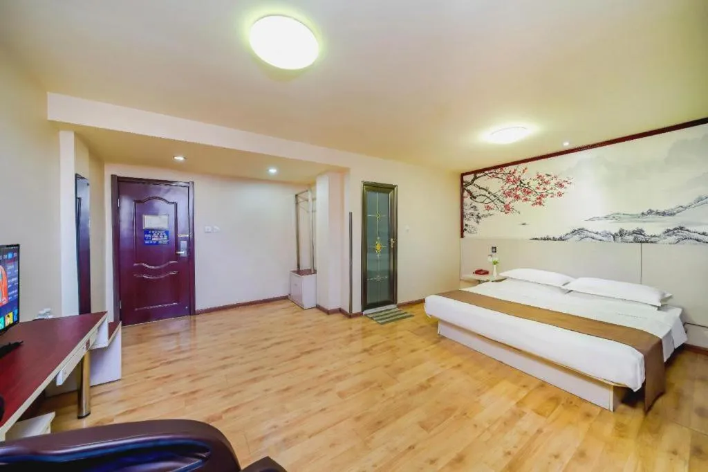 Bed in Kunlun Leju Business Hotel Kaifeng Gulou