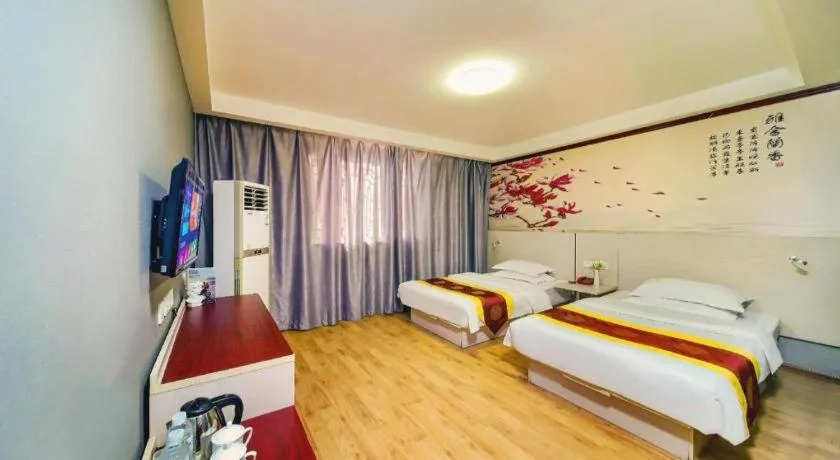 Bed in Kunlun Leju Business Hotel Kaifeng Gulou